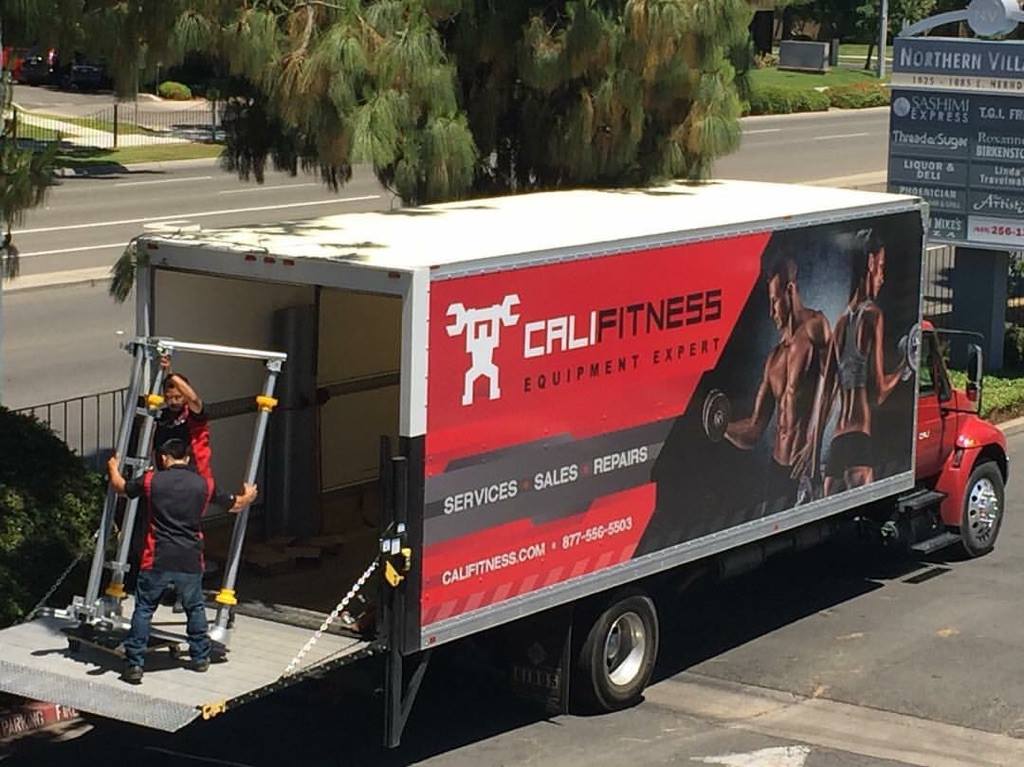 CaliFitness service truck with technician